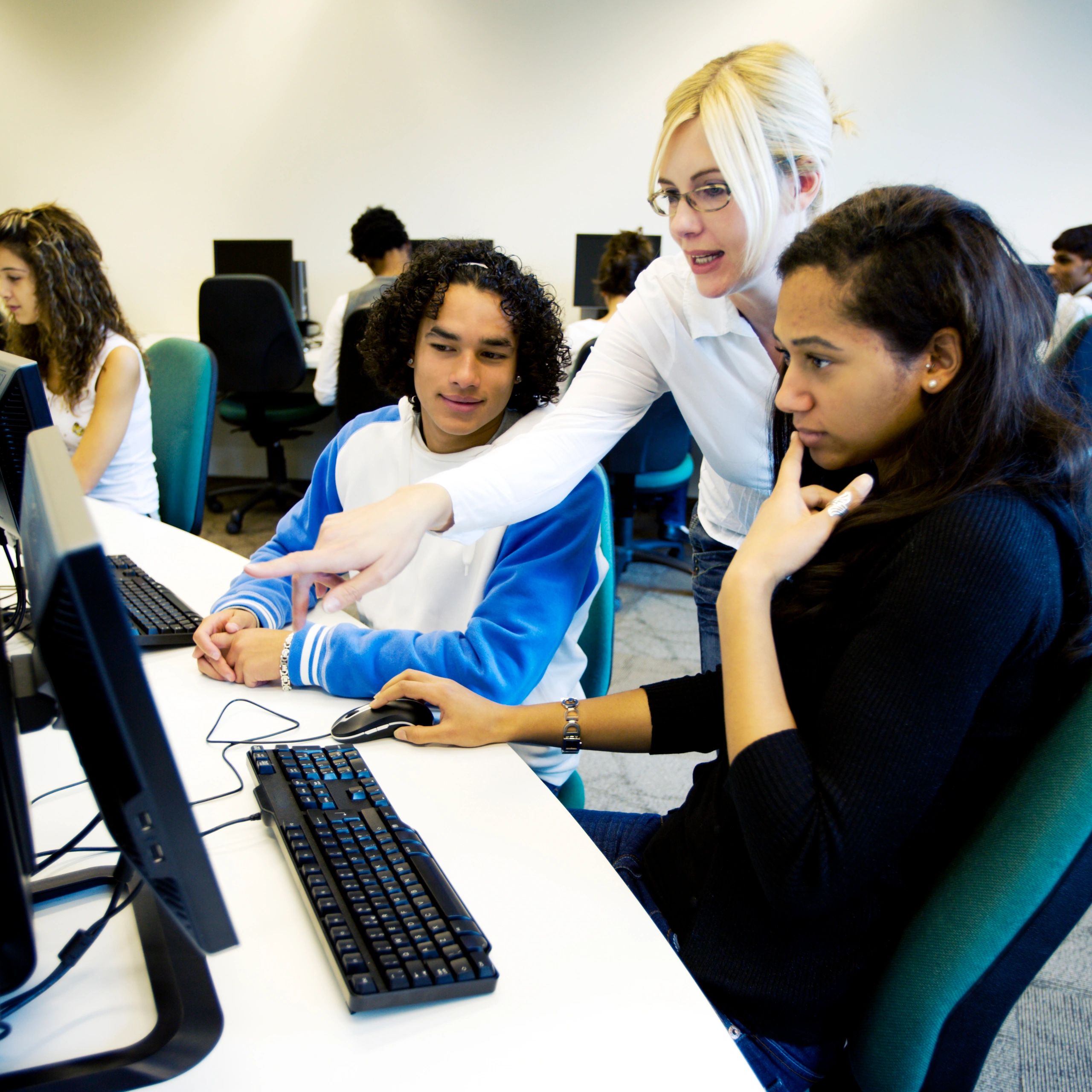 School staff working with computers