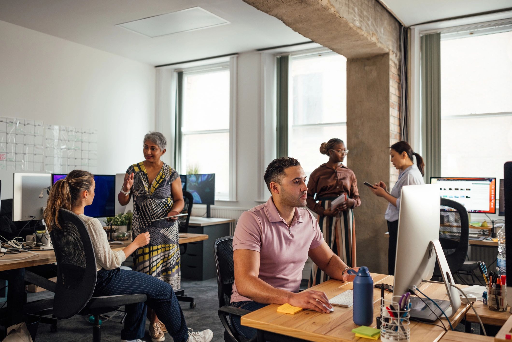 Silv IT support team collaborating in a modern office